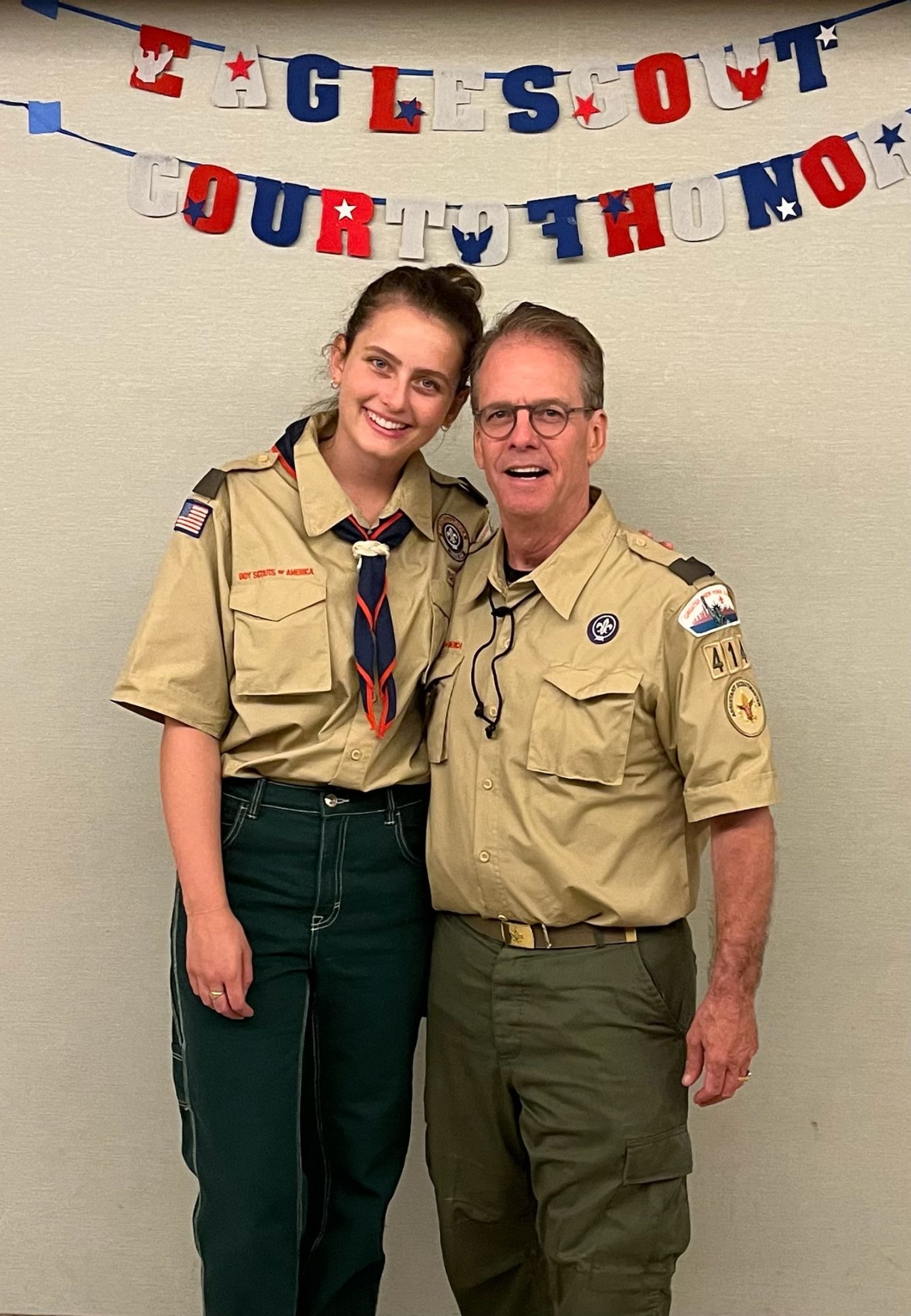 Sydney and a scout leader at an Eagle Scout Court of Honor